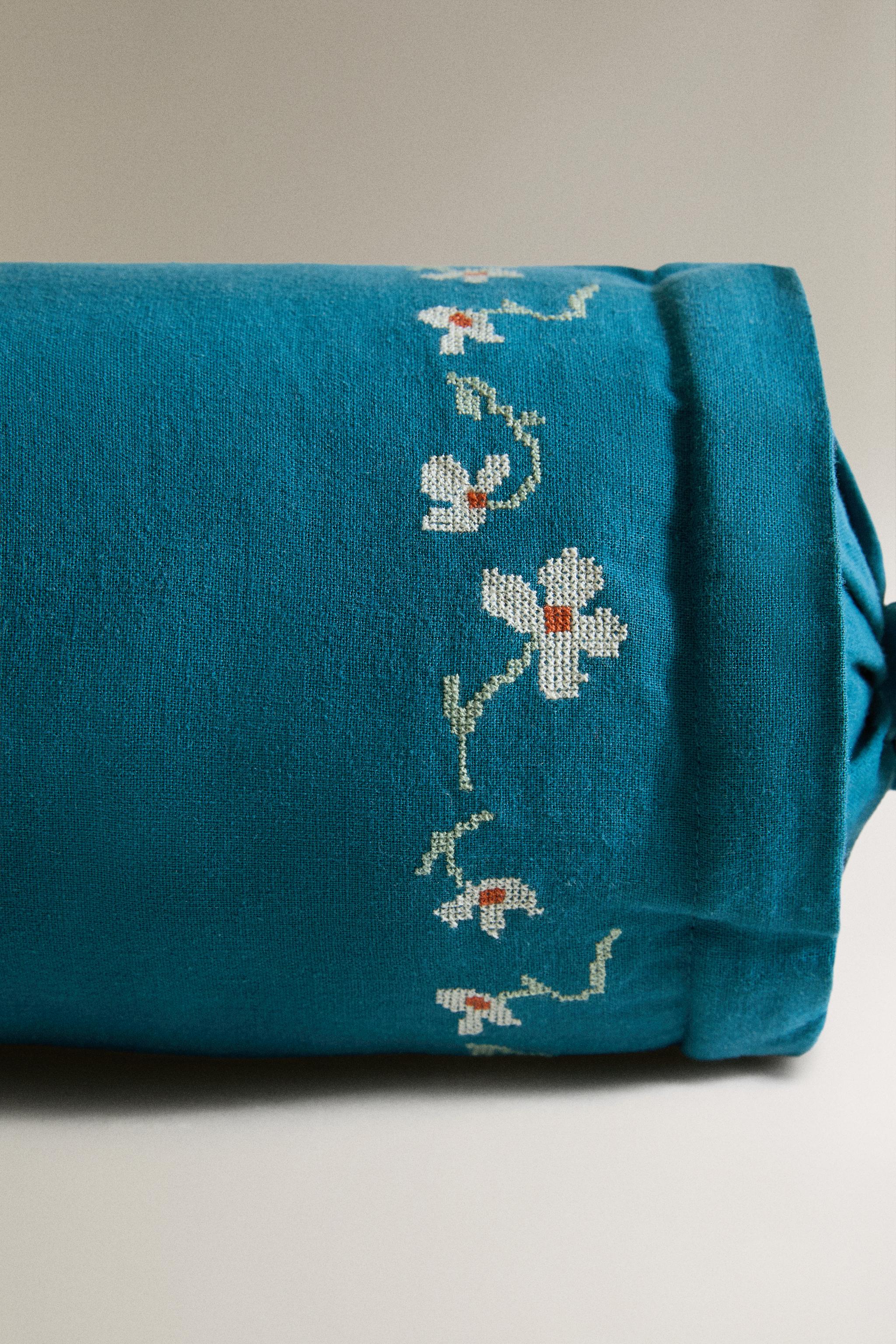 EMBROIDERED FLORAL BOLSTER PILLOW
